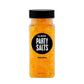 Small, clear plastic jar filled with orange bath salt that smells like pineapple. Each shot contains a fun surprise.
